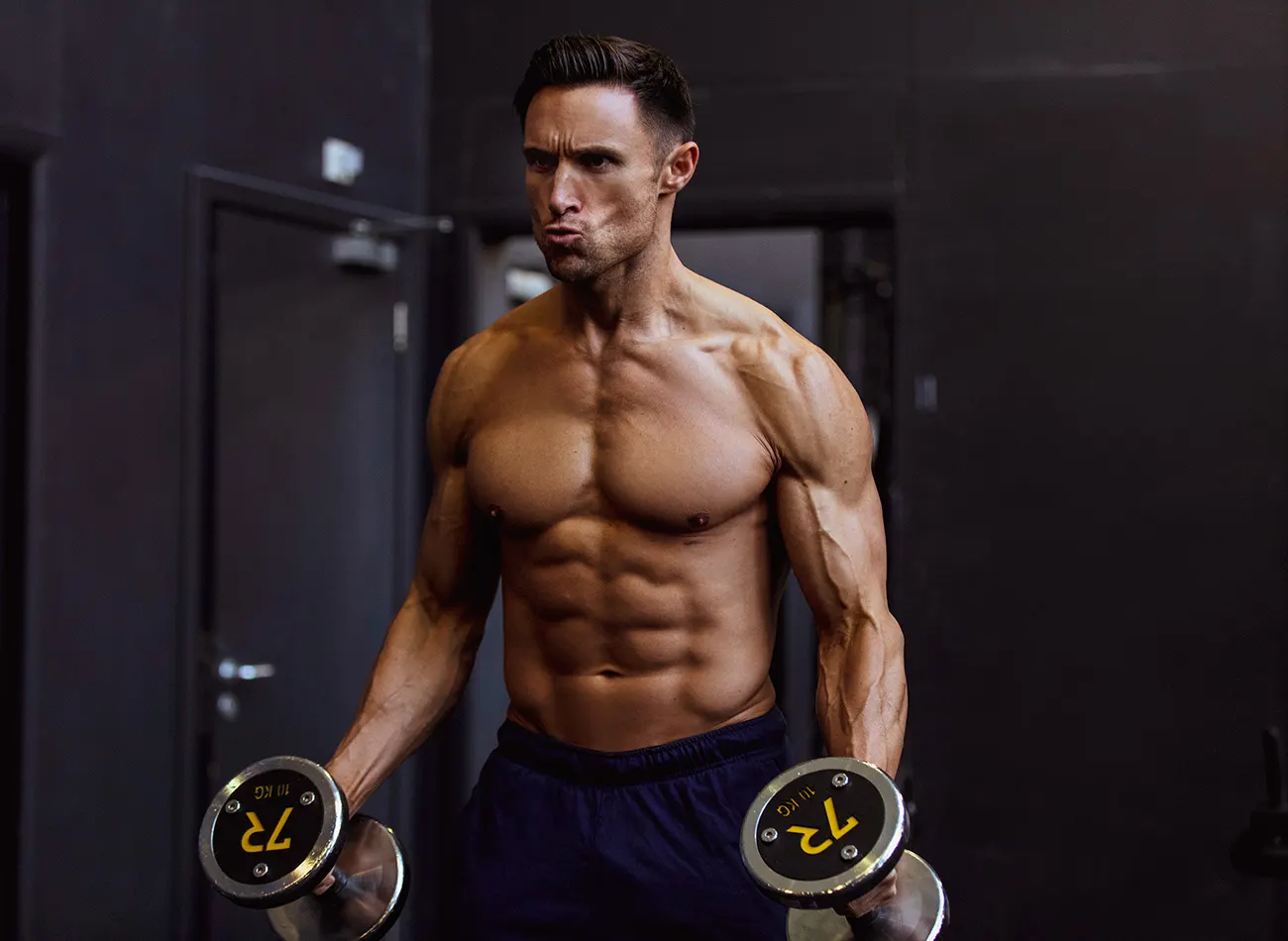 Kirk Miller training with dumbbells